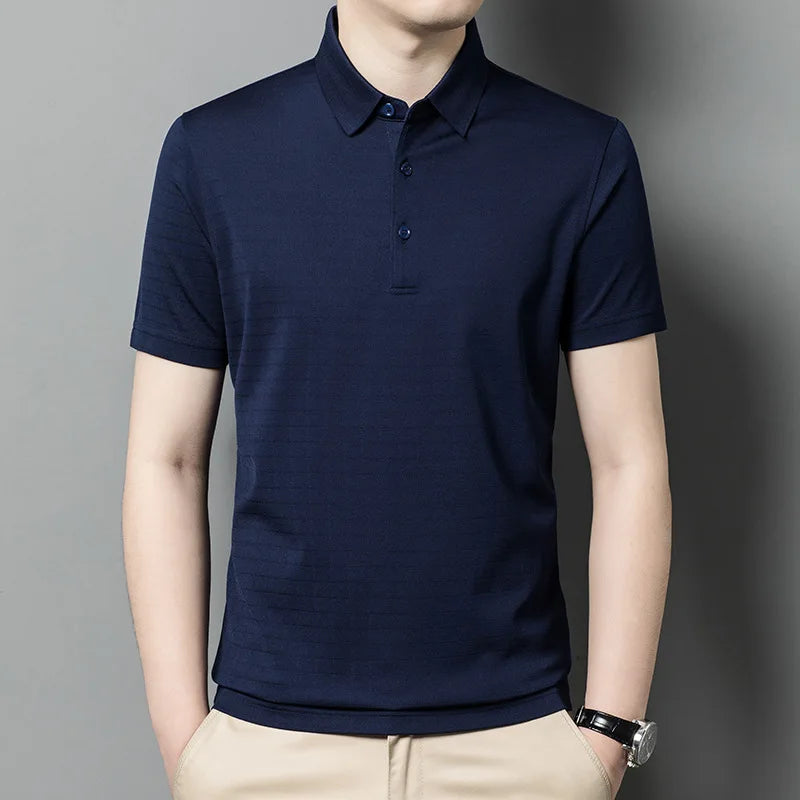 Men's Mulberry silk polo in Midnight Express with a textured grid — soft sheen, subtle structure, and a calm, deliberate presence. From Borcelleclothes.