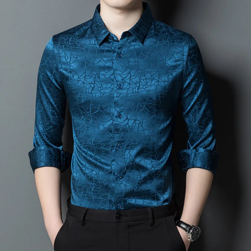 The front of the Men's Mulberry Silk Shirt in Chathams Blue, featuring an earth-inspired pattern with a dynamic interplay of matte and shiny finishes, crafted from 92.4% Mulberry silk and 7.6% spandex, ideal for formal and semi-formal occasions. From Borcelleclothes.