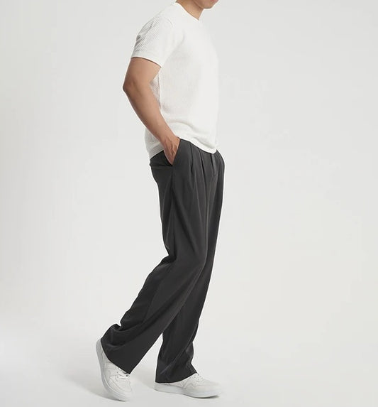 Side view of Onyx Mulberry Silk trousers showing straight-leg silhouette, clean side seam, and subtle drape. From Borcelleclothes.