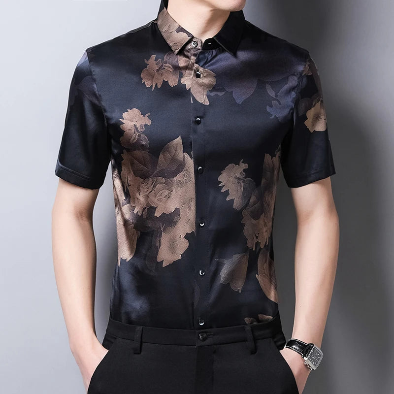 Men's Nature-Inspired Mulberry Silk Shirt featuring large royal roses half-submerged in a deep blue background, evoking a sense of calm and tranquility, complemented by delicate purple accents that enhance the design's depth and mystery. From Borcelleclothes.
