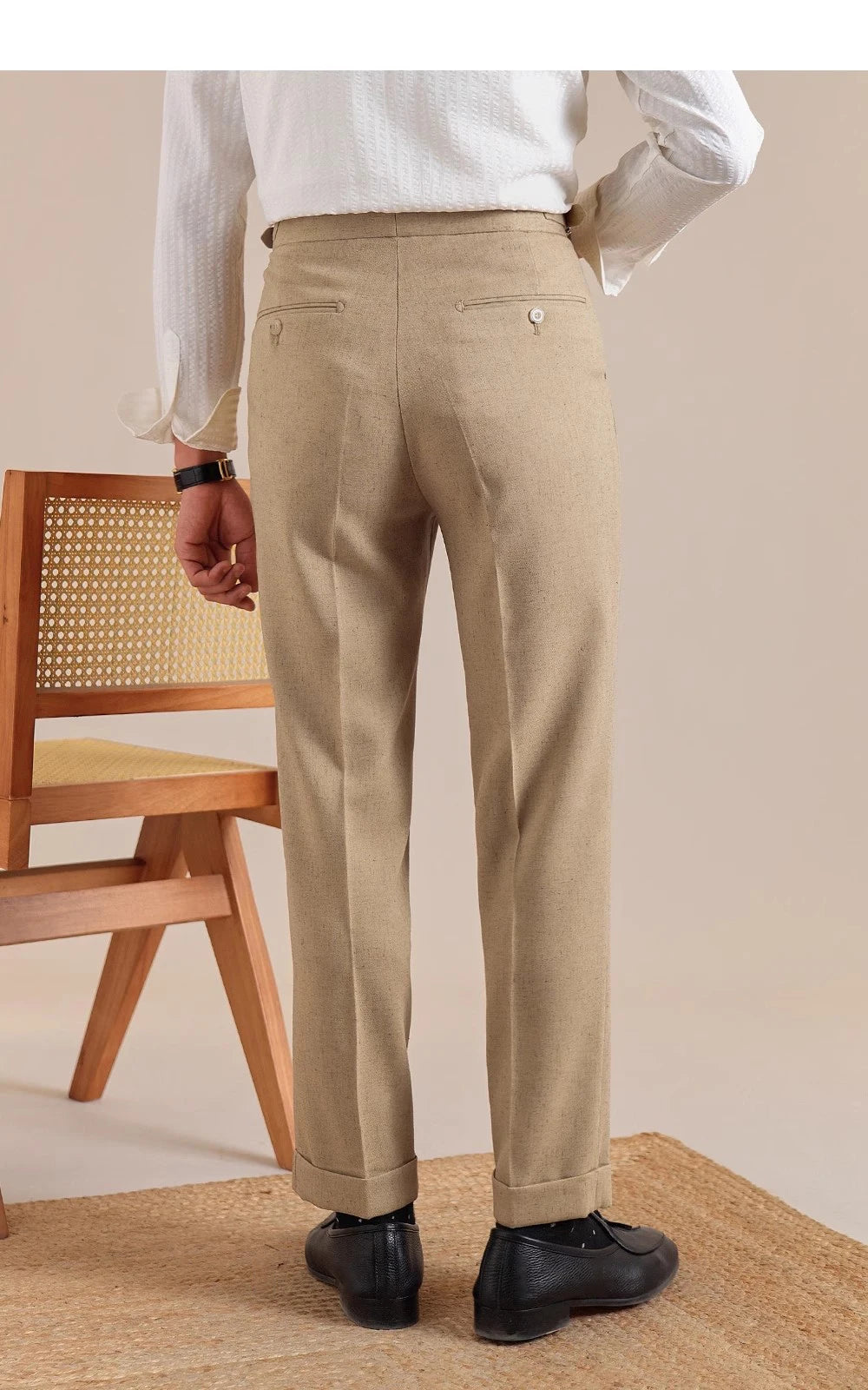 Back view of Sandrift trousers—clean lines, natural drape, and subtle structure in a muted tone. From Borcelleclothes.