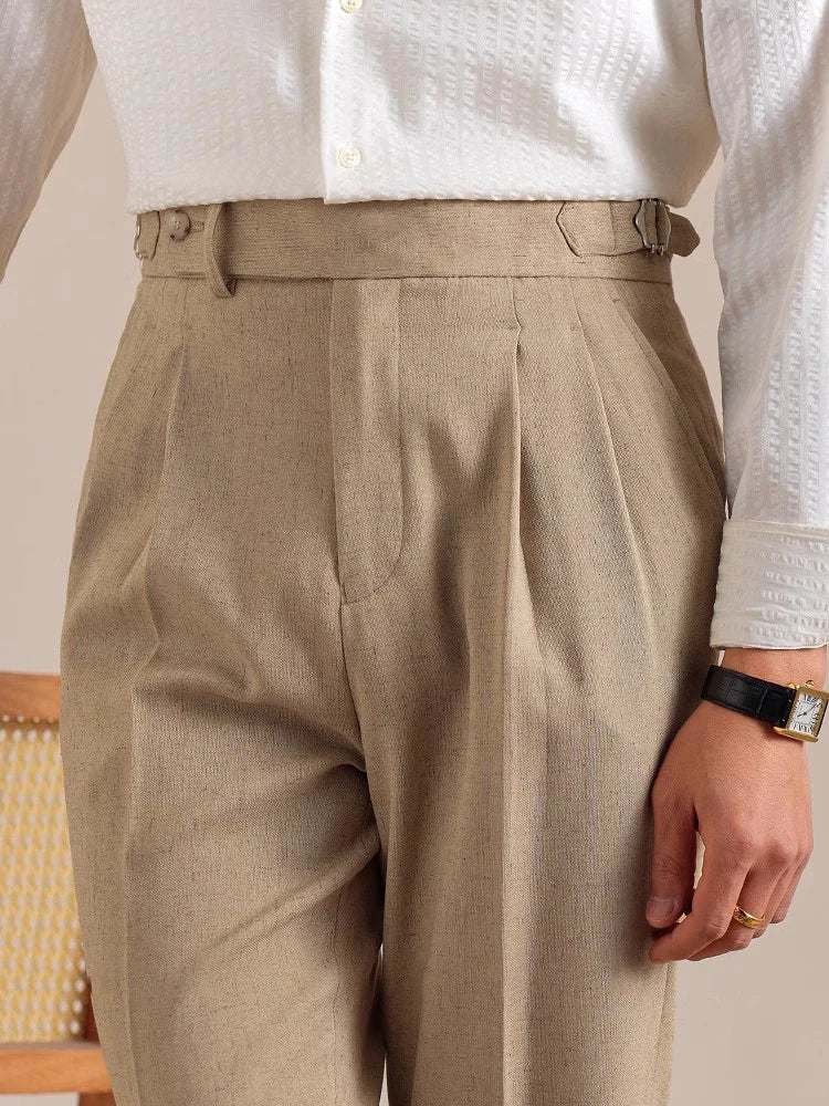 Upper part of Sandrift cropped trousers—featuring flat front, beltless waist, and side adjusters for a refined fit. From Borcelleclothes.
