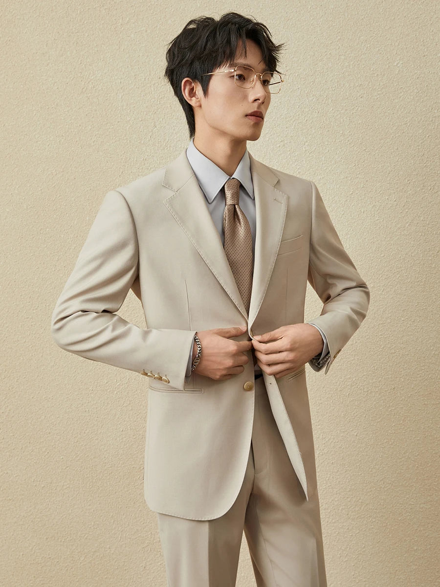 Men’s notched lapel suit in Ash — featuring a single-breasted blazer with horn buttons, matching straight-leg trousers, and an optional vest, all tailored in a refined viscose blend. From Borcelleclothes.