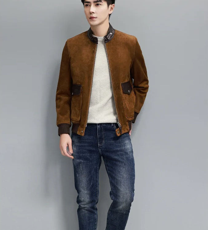 Nutmeg Suede Bomber — model looking to the side; nutmeg suede with leather collar, hip-length fit. From Borcelleclothes.