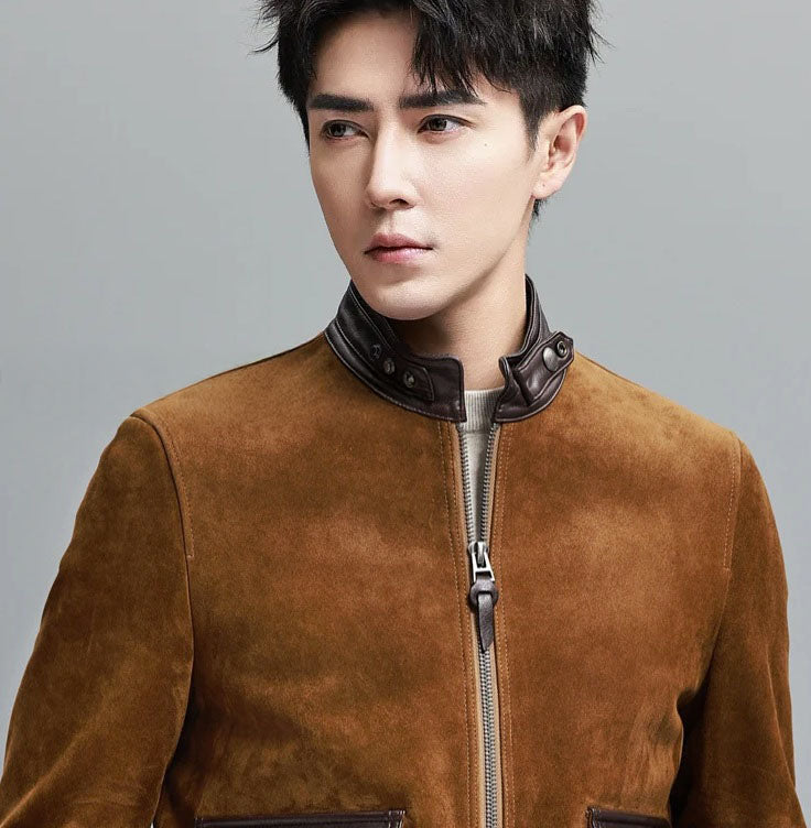 Nutmeg Suede Bomber — upper section on model; smooth-leather stand collar, curved chest line, tactile suede. From Borcelleclothes.