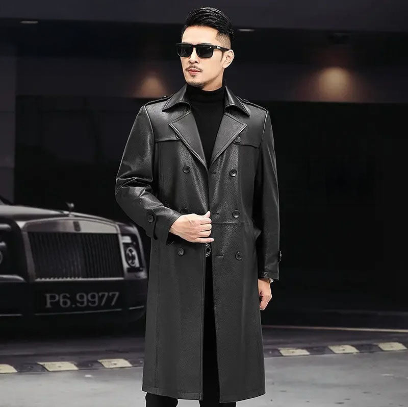 Men’s Onyx cowhide leather trench coat unfastened, model holding the front side — From Borcelleclothes.