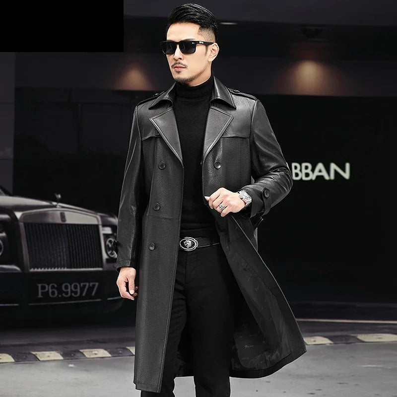 Men’s Onyx cowhide leather trench coat with grain texture, double-breasted front, storm flaps, belt, and back vent — From Borcelleclothes.