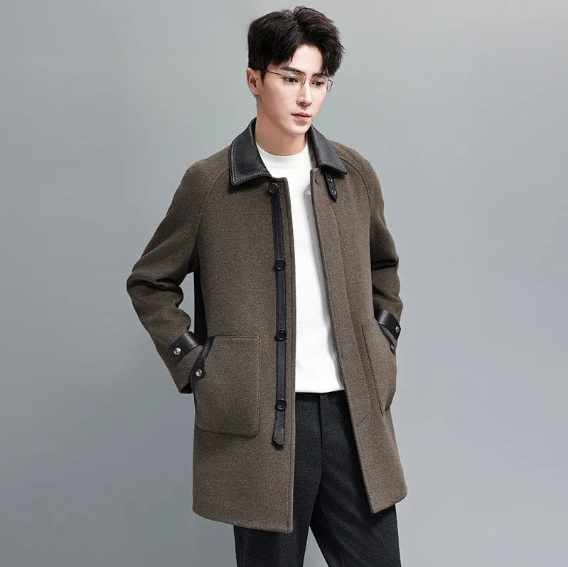 Makara color men’s coat – model with hands in coat pockets. From Borcelleclothes.