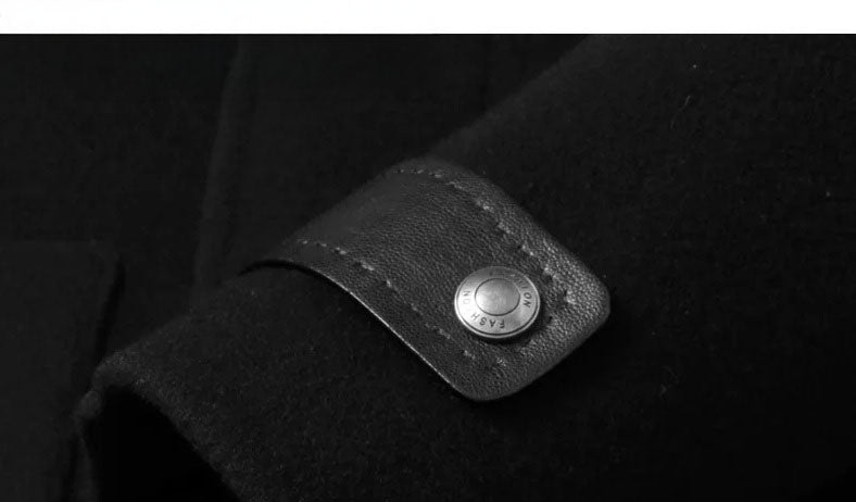 Onyx color men’s coat – sleeve tab with metal snap accent. From Borcelleclothes.