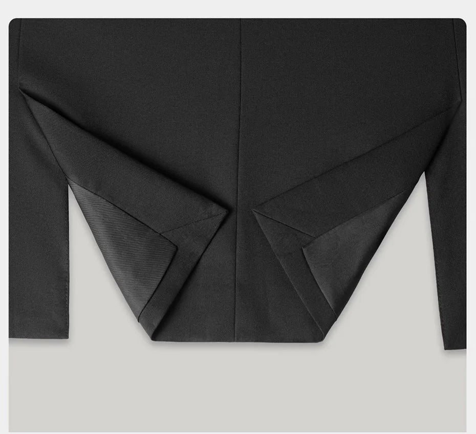 Blazer’s front hem unfolded to reveal inner structure and finish. From Borcelleclothes.