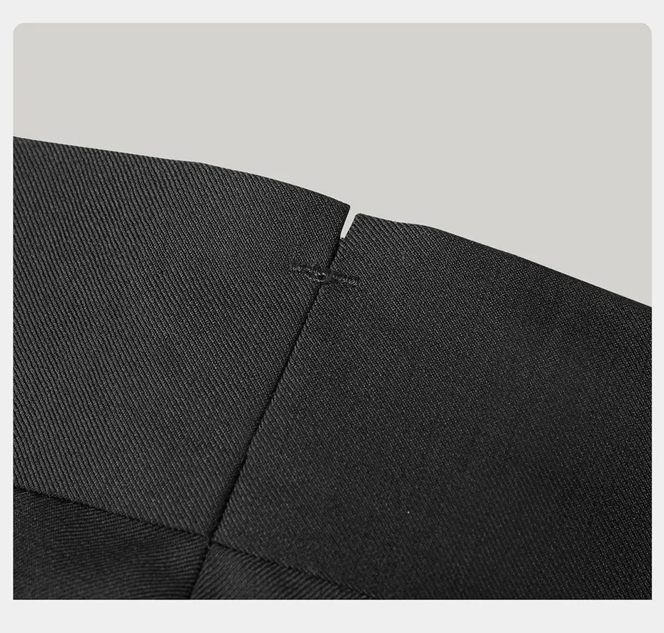 Back waistband V-split on the trousers, a subtle design for comfort and refinement. From Borcelleclothes.