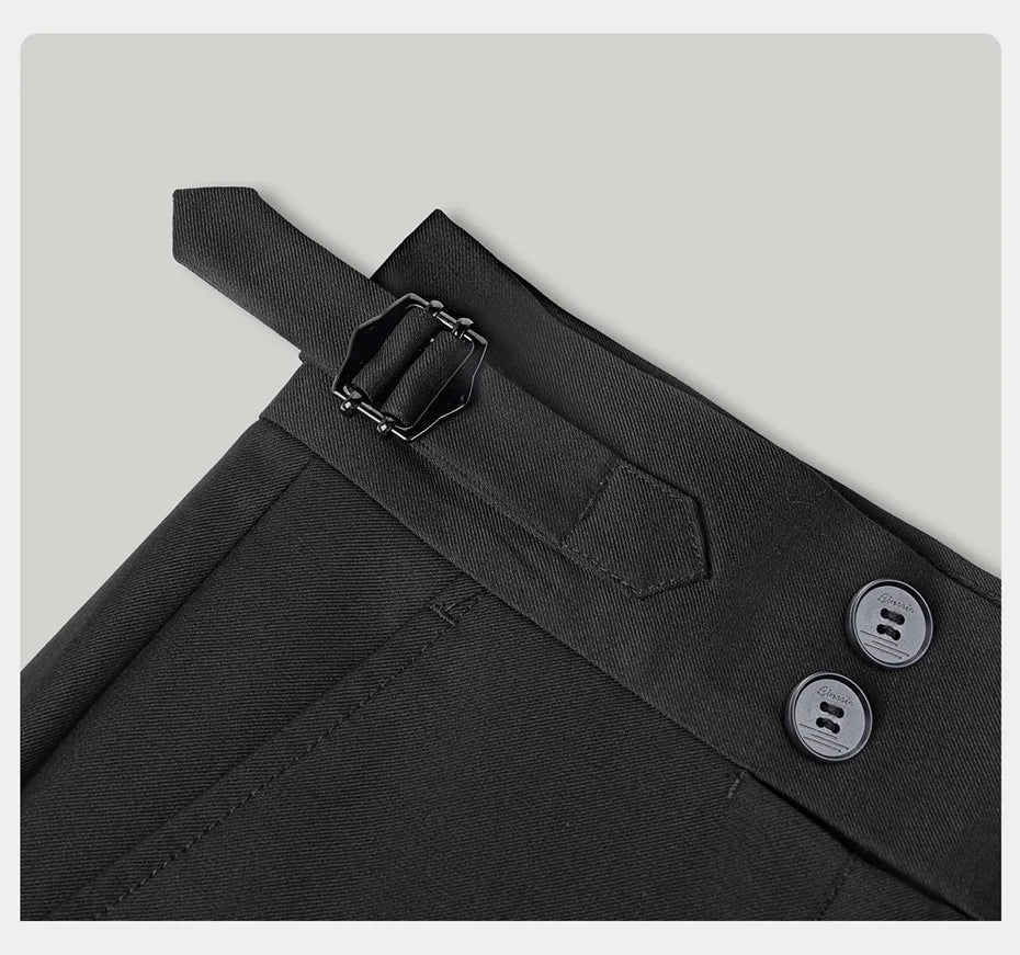 Side view of the trousers featuring a side adjuster and two-button waistband closure. From Borcelleclothes.