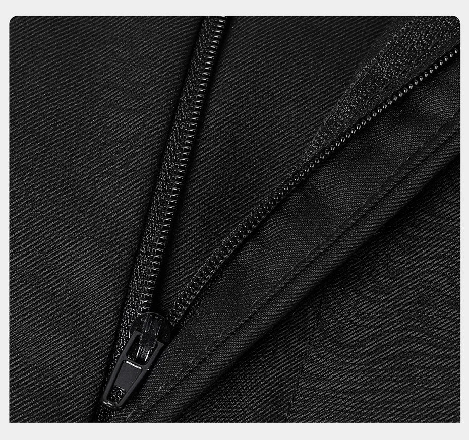 Detail of the trousers’ front zipper fly partially unzipped, showing construction. From Borcelleclothes.