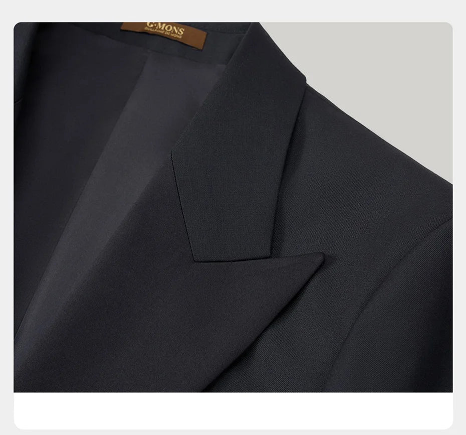 Close-up of left peaked satin lapel on Onyx Wool Tuxedo — traditional with a modern edge. From Borcelleclothes.