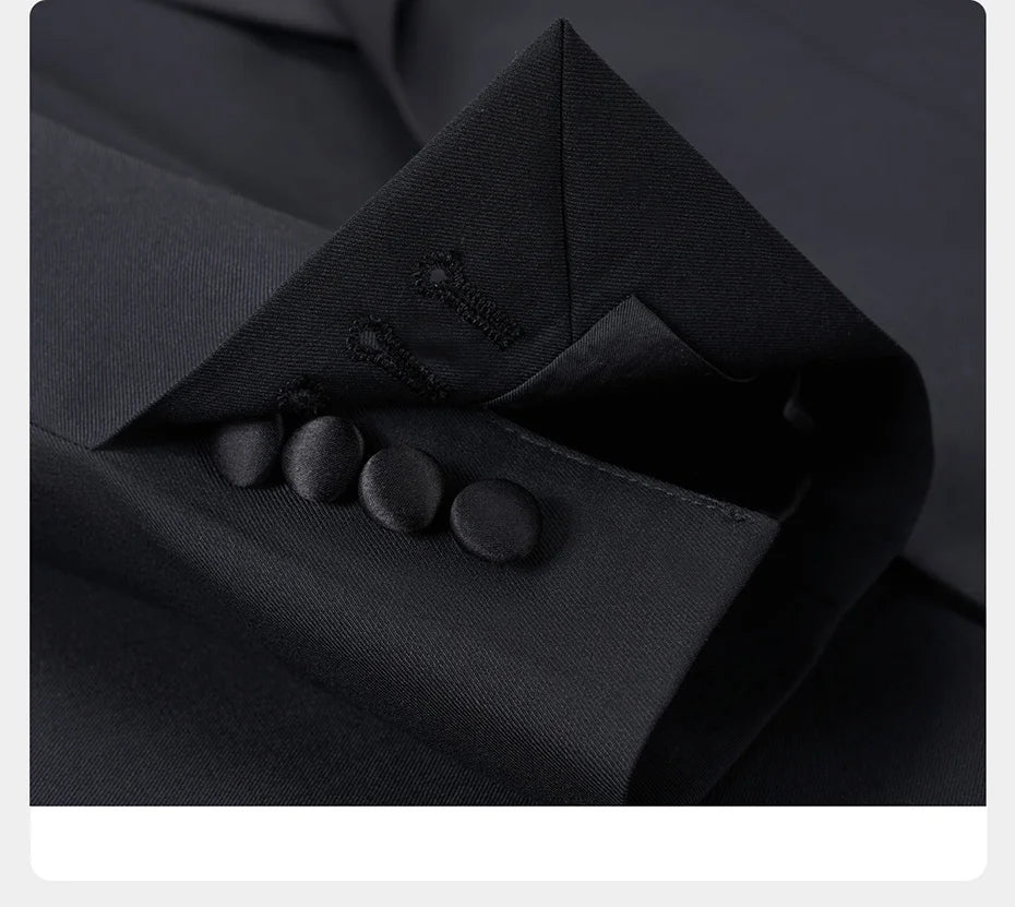 Unfastened satin sleeve placket — revealing handmade buttonholes and tailoring detail. From Borcelleclothes.