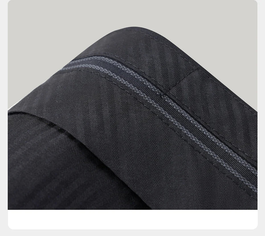 Interior waistband with gripper tape — designed to keep shirts neatly tucked in. From Borcelleclothes.