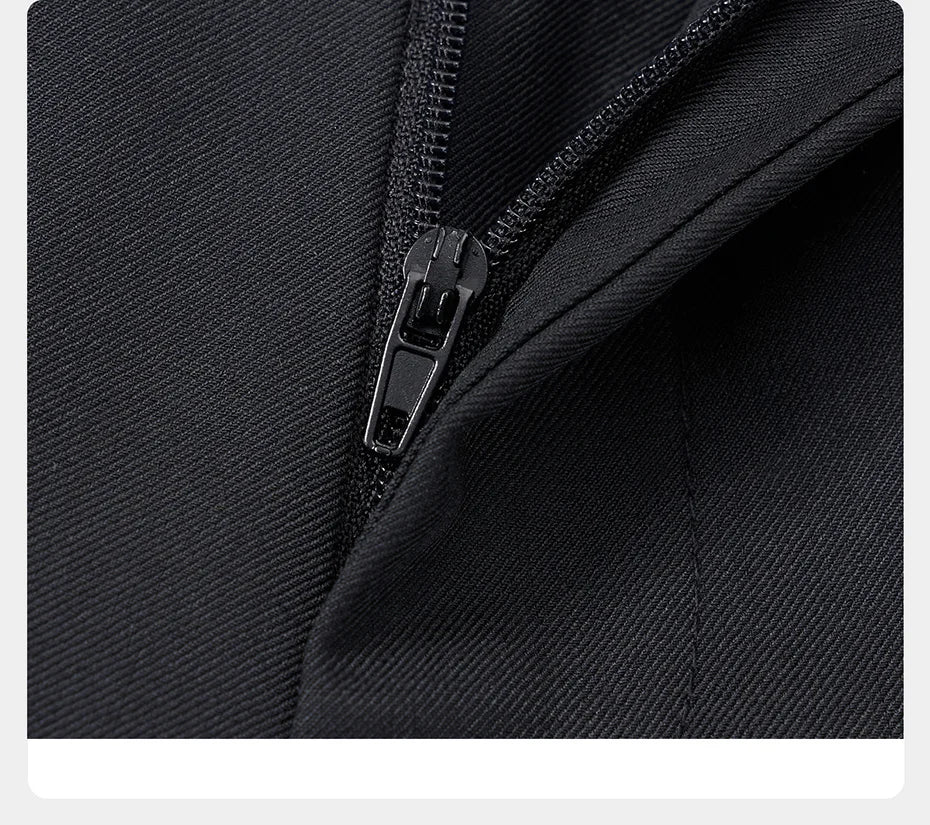 Open zipper fly of tuxedo pants — emphasizing fit and precision tailoring. From Borcelleclothes.
