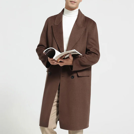 Men’s double-breasted wool coat with peaked lapels in Spice—crafted for silence, weight, and enduring presence. From Borcelleclothes.