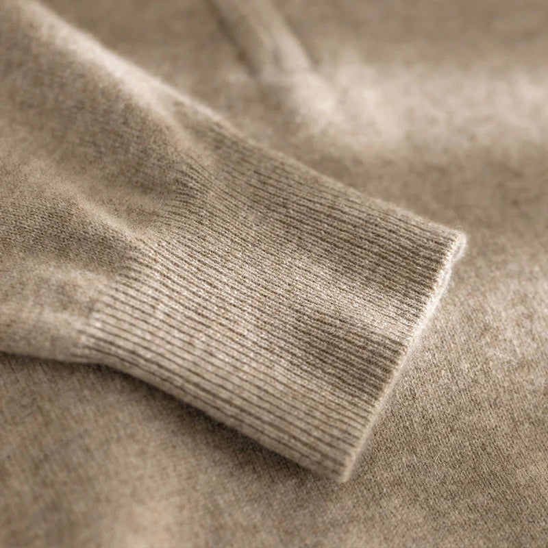 Detailed view of the cuff in 1×1 ribbed texture on the Sandrift plain stitch cashmere sweater, emphasizing craftsmanship and softness — From Borcelleclothes.