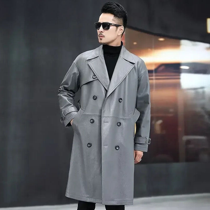Men’s Regent Grey cowhide leather trench coat, model with hand in pocket — From Borcelleclothes.