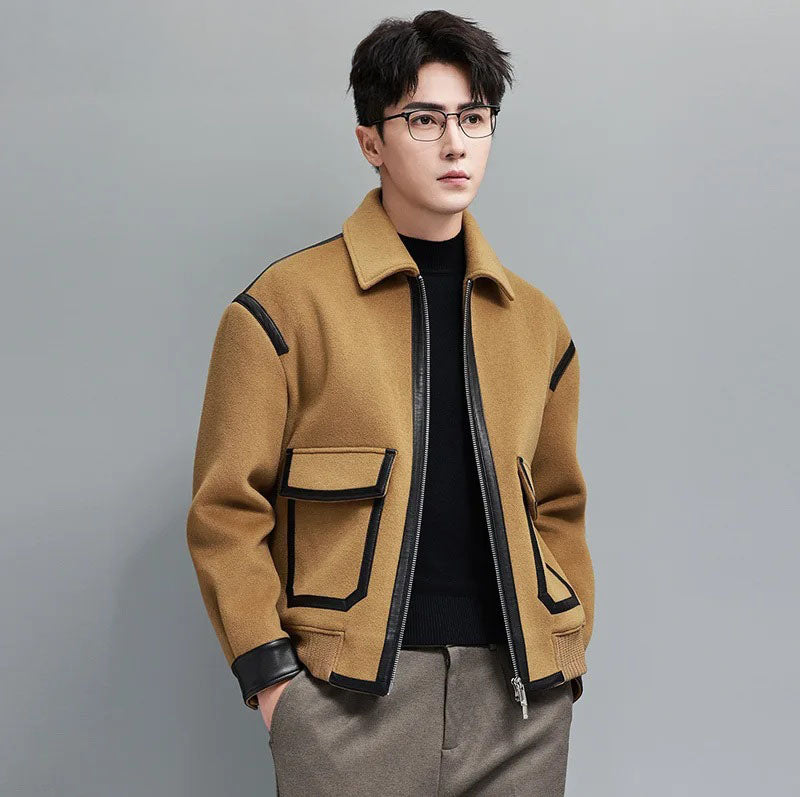 Wool-and-cashmere jacket in Lion with leather trims, model standing with hands in pants pockets — From Borcelleclothes.