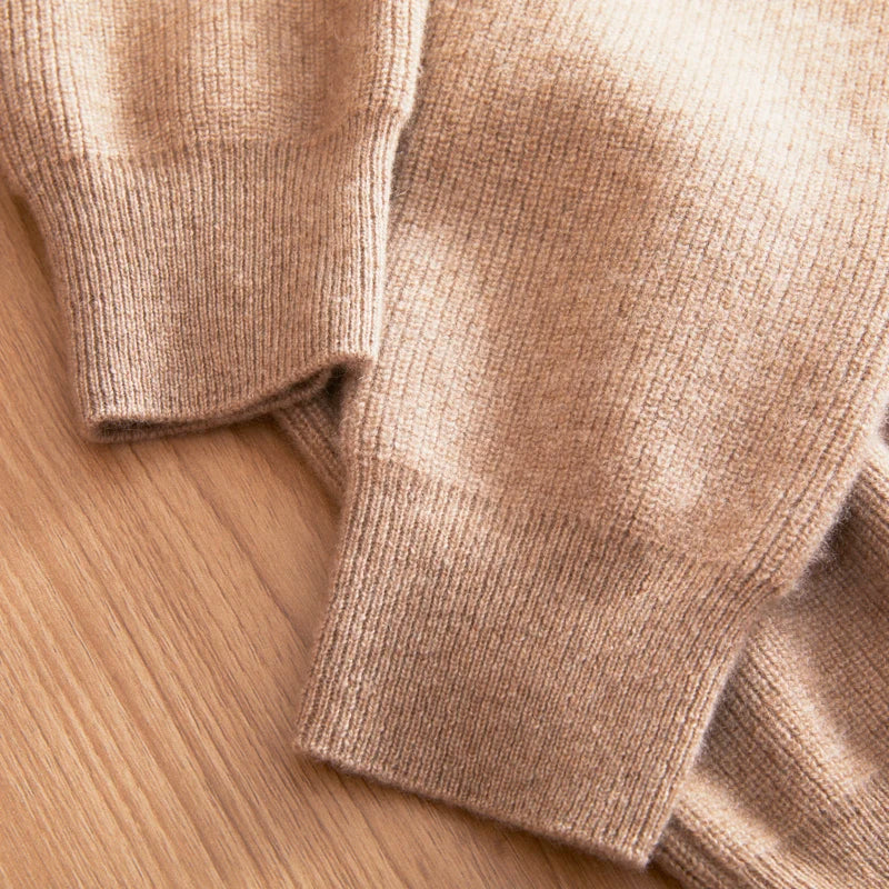 Close detail of the ribbed cuffs in French Beige Himalayan cashmere — From Borcelleclothes.