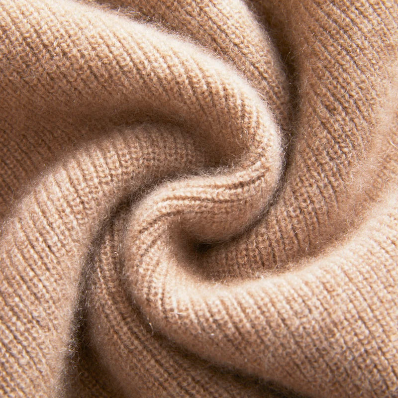 Spiral-folded display of the fisherman rib texture in French Beige Himalayan cashmere — From Borcelleclothes.