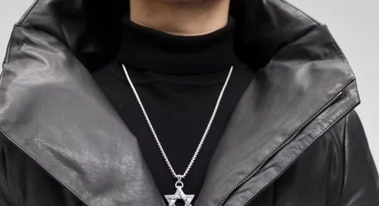 Close-up of expanded lapel collar on sheepskin jacket, showing sculptural structure. From Borcelleclothes.