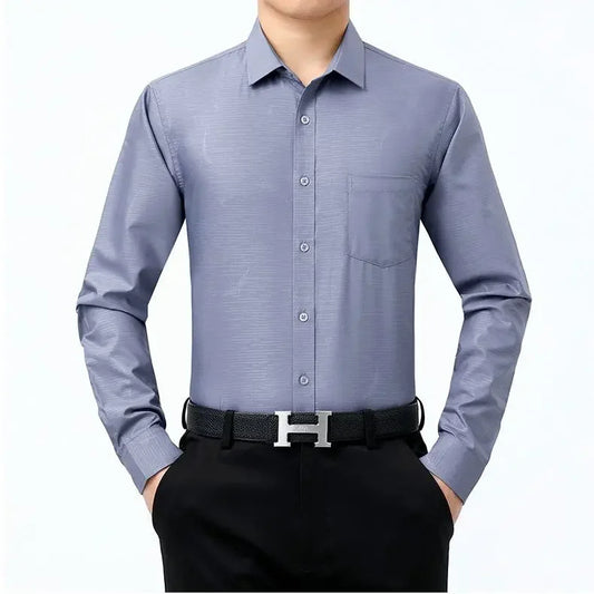 The front of the Men’s long sleeve silk shirt in Blue Haze featuring a refined haze pattern with subtle feather accents for an elegant and timeless look. From Borcelleclothes.