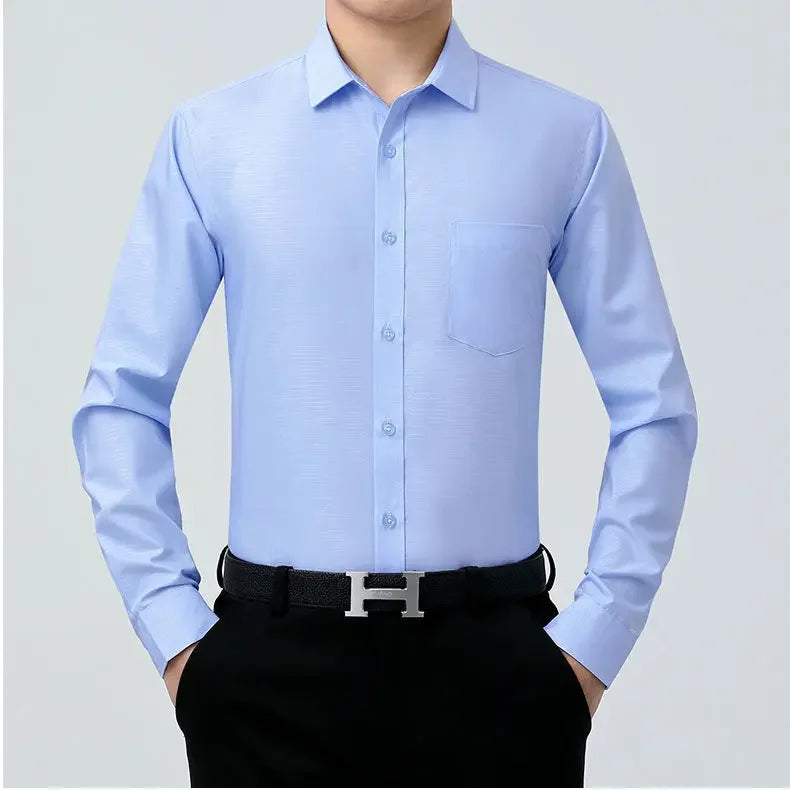 Men’s long sleeve silk shirt in Light Periwinkle featuring a refined haze pattern with subtle feather accents for an elegant and timeless look. From Borcelleclothes.