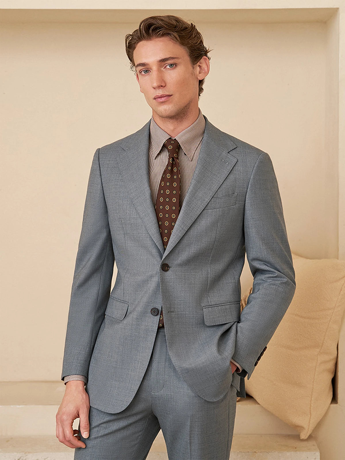 Model wearing the Borcelleclothes Men's Storm Grey Slim-Fit Suit, with one hand in the pants pocket, showcasing the tailored fit and sleek design.