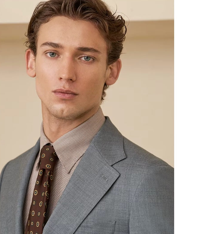 The upper part of the Borcelleclothes Men's Storm Grey Slim-Fit Suit, focusing on the notch lapels and single-breasted blazer design.