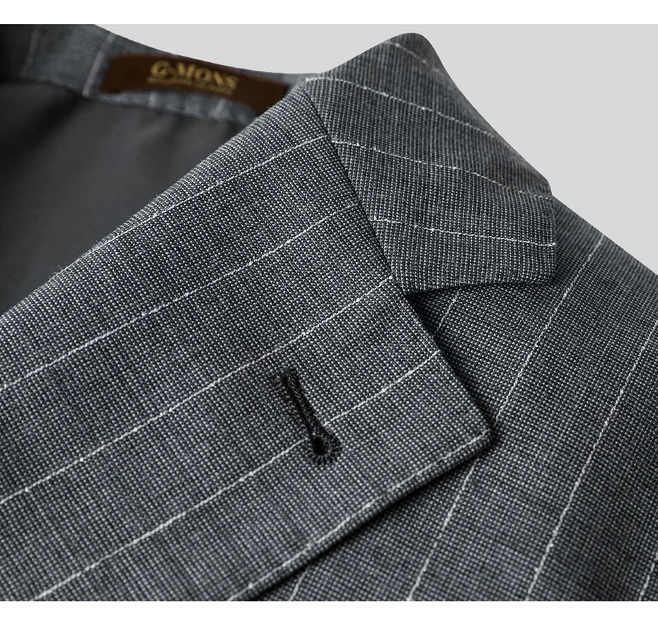 Close-up of the blazer’s notch lapel with handmade buttonhole — a quiet mark of craftsmanship. From Borcelleclothes.