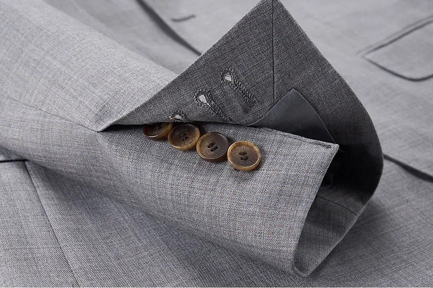 Sleeve placket unfastened to show buttonholes and refined edge stitching. From Borcelleclothes.