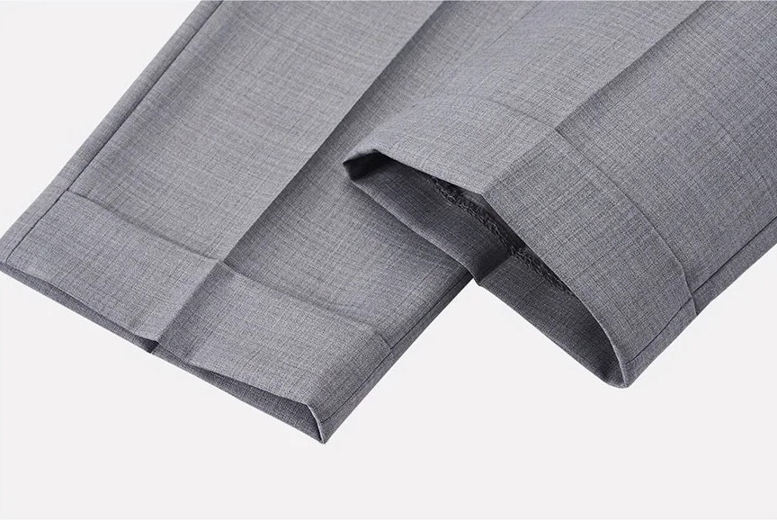 Turned-back trouser cuffs, emphasizing British tailoring style. From Borcelleclothes.