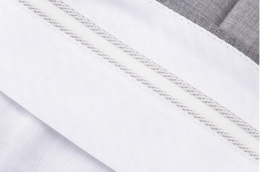 Inside waistband gripper tape to keep shirts in place. From Borcelleclothes.