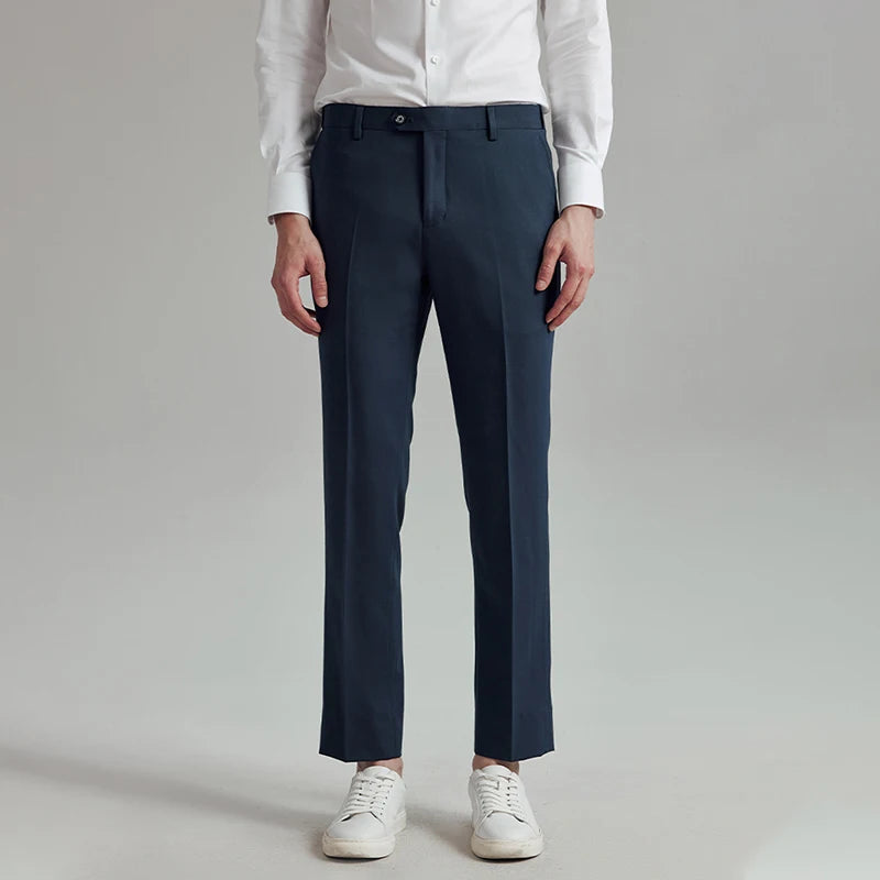 Full front view of the model in River Bed tailored cropped trousers, showcasing the streamlined cut. From Borcelleclothes.