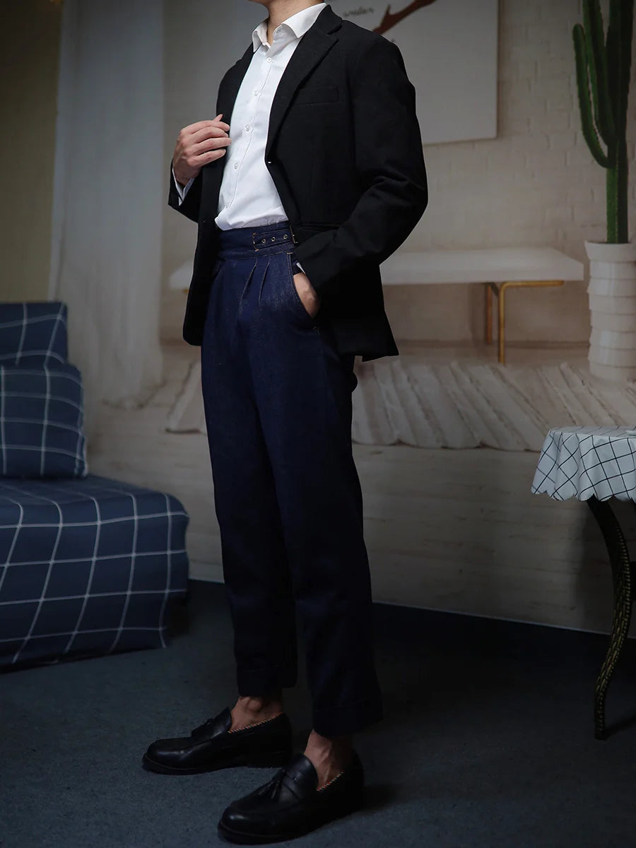 Model wears a black blazer with the Midnight Express denim trousers, blending casual fabric with refined tailoring. From Borcelleclothes.