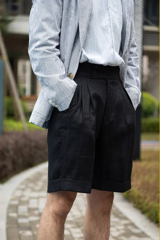 Tailored men's shorts in deep onyx linen, featuring a clean front, structured silhouette, and sharp tailoring for warm-weather refinement. From Borcelleclothes.