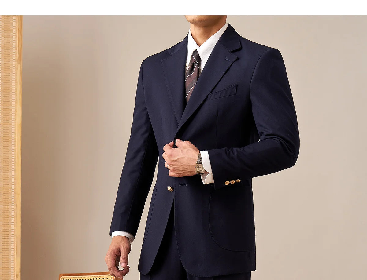 Model wearing complete Midnight Express suit with matching tailored jacket and trousers. From Borcelleclothes.