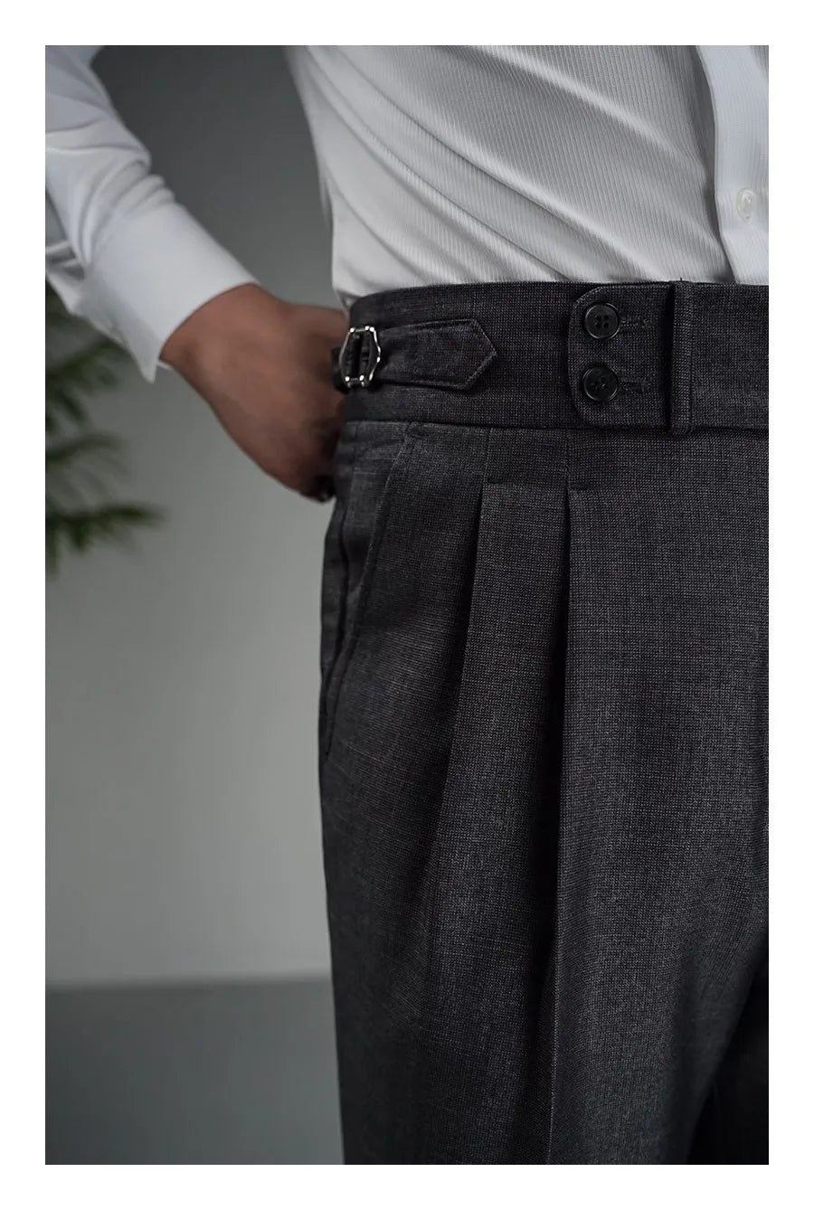 Right front section of Payne’s Grey trousers showing stitched pleats and cropped hem. From Borcelleclothes.