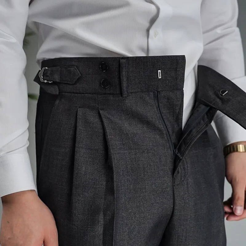 Close-up of front closure on Payne’s Grey trousers with unzipped fly showing smooth construction. From Borcelleclothes.
