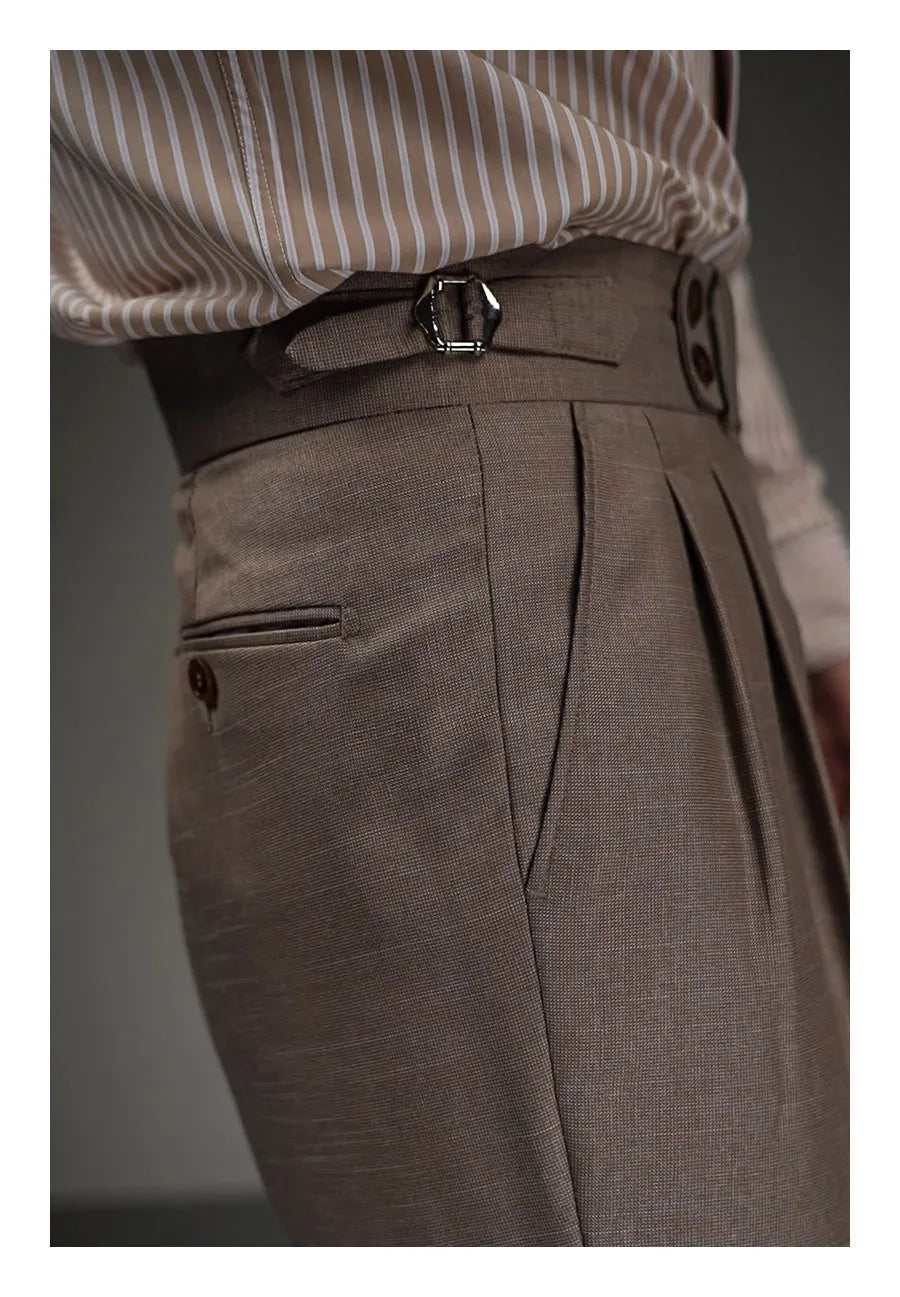 Right hip section of Wenge trousers showing pleat construction and clean pocket line. From Borcelleclothes.