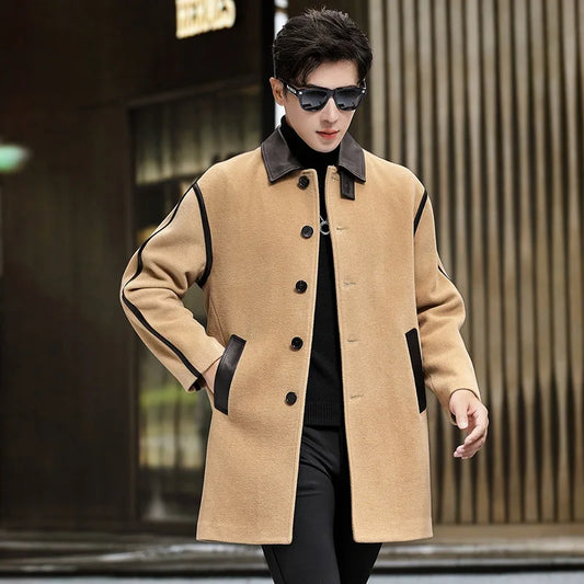 Men’s urban leather-trim wool coat in Lion, with pointed leather collar, raglan sleeves, and graphic seam detailing — From Borcelleclothes.