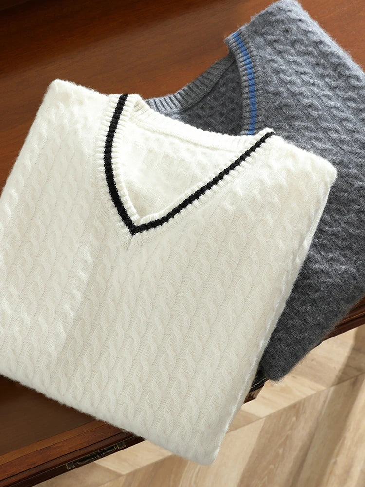 Folded display of the men’s cashmere sweaters in Davy Grey and Platinum — From Borcelleclothes.