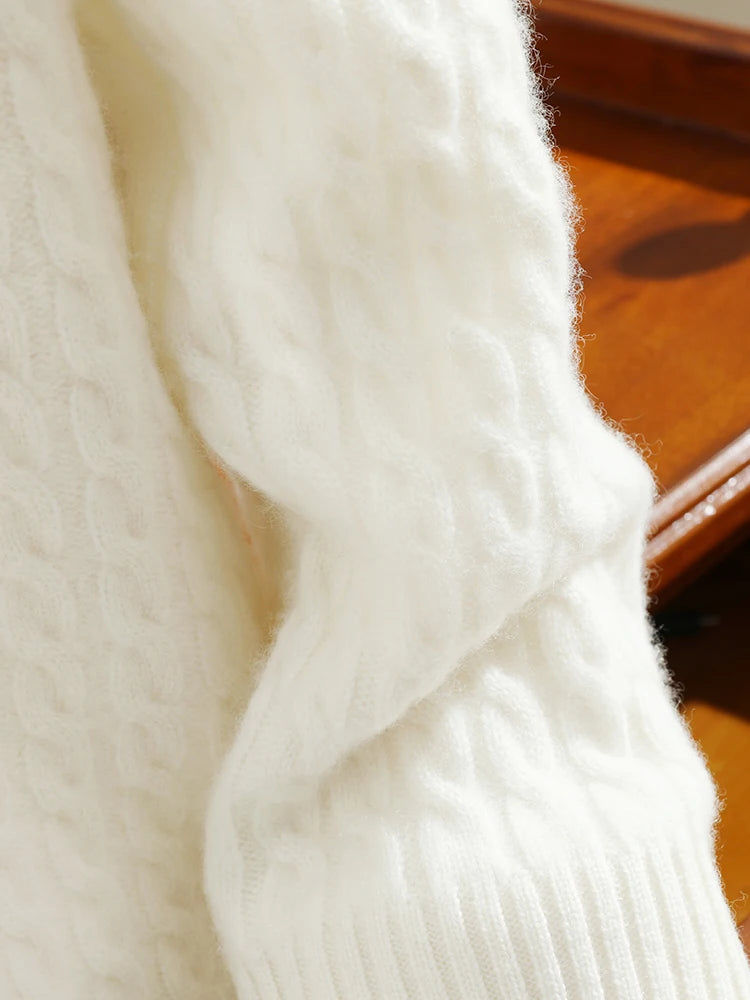 Sleeve in cable-knit texture and ribbed cuff of the Platinum cashmere sweater — From Borcelleclothes.