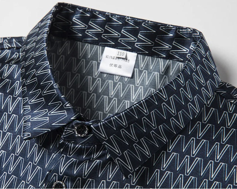 W pattern and glossy finish on the collar of the Mulberry silk polo in Midnight Express. From Borcelleclothes.