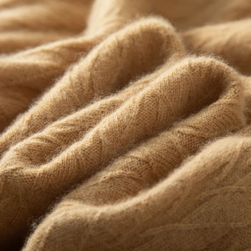 Serpentine-folded texture of the Men's Wheat Spikes Alashan Cashmere Sweater in Lion, showcasing its intricate wheat spike pattern and luxurious material. From Borcelleclothes.