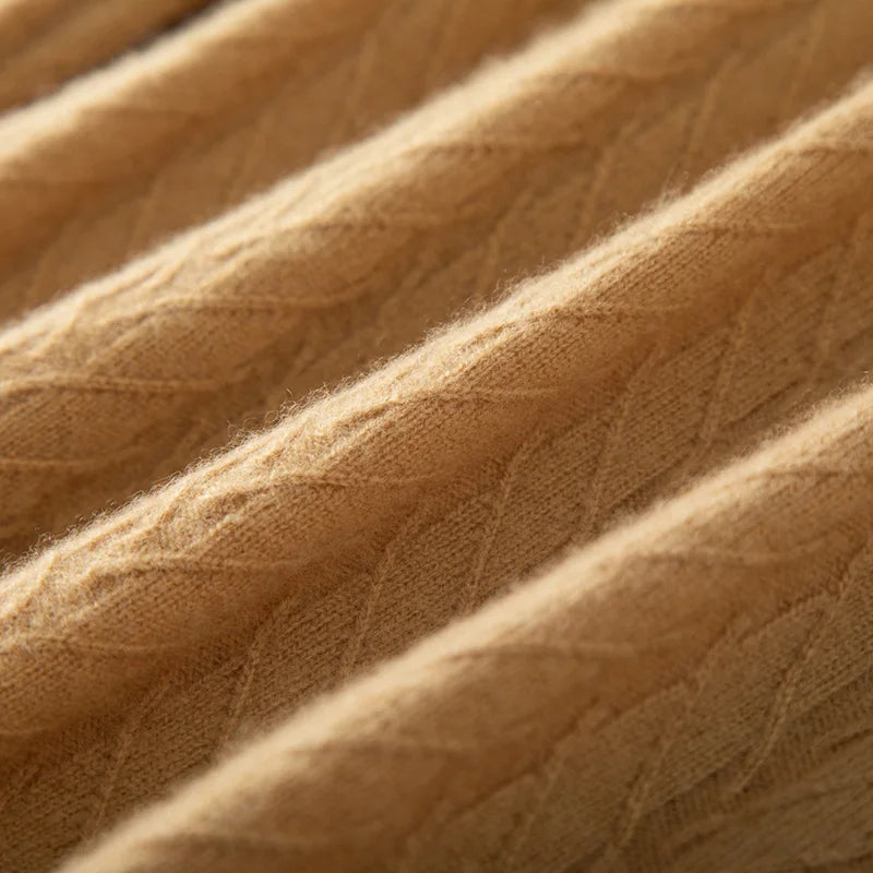 Wave-folded texture of the Men's Wheat Spikes Alashan Cashmere Sweater in Lion, highlighting the elegance of its intricate wheat spike design. From Borcelleclothes.