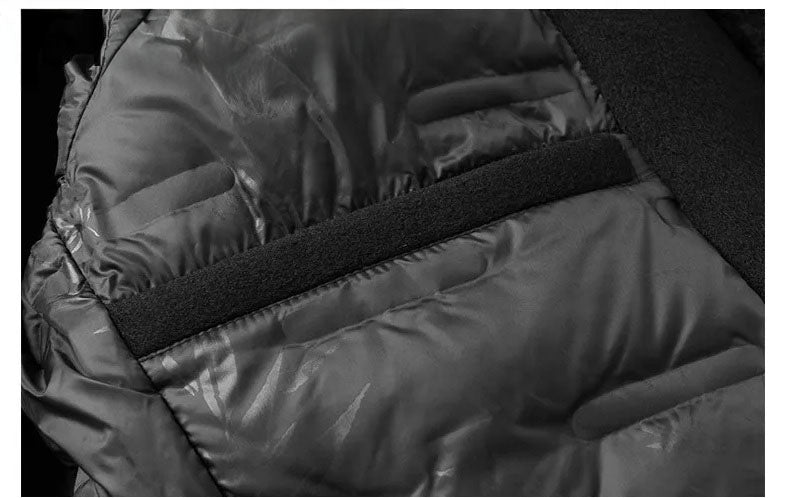 Men’s wool-cashmere coat with shearling peaked lapels in Onyx, close-up of interior patch pocket trimmed with wool fabric. From Borcelleclothes.